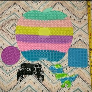 5 POP ITS FIDGETS. APPLE IS HUGE APPROXIMATELY 14X14 INCHES. PERFECT FOR EASTER